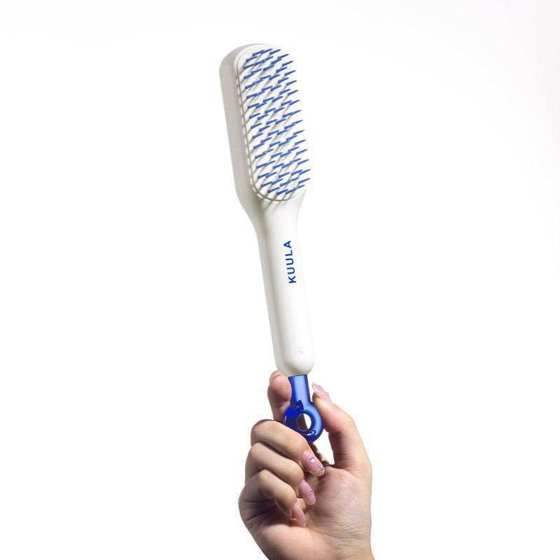 TangleEase™ - Detangling Brush