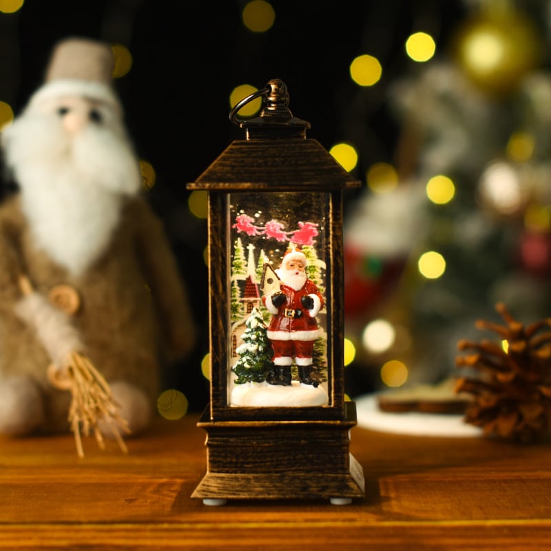 LumaLantern™ – LED Christmas Lantern with Rotating Scene & Glittering Snow Effect