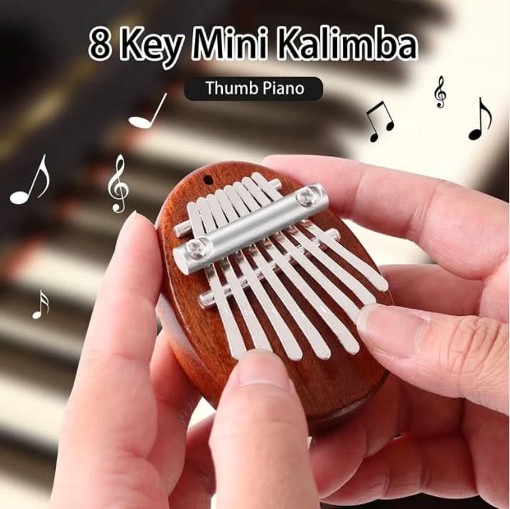 HarmoPalm™ - Play Soothing Tunes Effortlessly with This Mini Thumb Piano