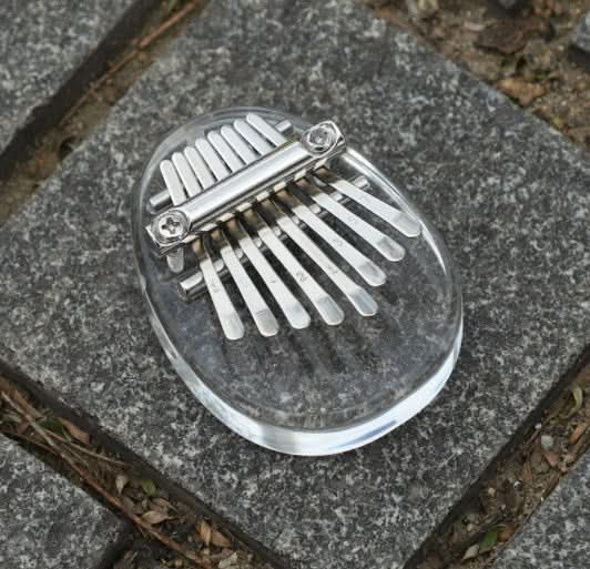 HarmoPalm™ - Play Soothing Tunes Effortlessly with This Mini Thumb Piano