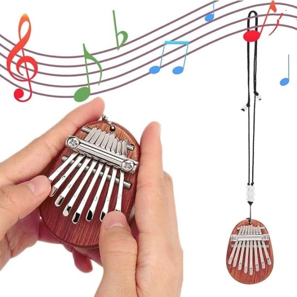 HarmoPalm™ - Play Soothing Tunes Effortlessly with This Mini Thumb Piano